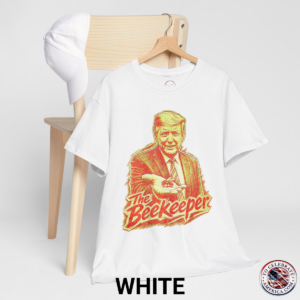 White T‑shirt featuring a pencil‑sketch illustration of President Trump holding a small bee in an outstretched hand, with stylized ‘The Beekeeper’ text below.