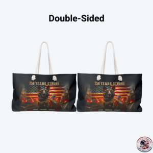 Large black weekender tote bag featuring a patriotic tactical K9 German Shepherd graphic under the text "250 Years Strong" and a distressed American flag backdrop. The bag rests on a white background, showcasing thick cream cotton rope handles with gold metal grommets.