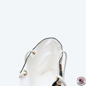 Large black weekender tote bag featuring a patriotic tactical K9 German Shepherd graphic under the text "250 Years Strong" and a distressed American flag backdrop. The bag rests on a white background, showcasing thick cream cotton rope handles with gold metal grommets.