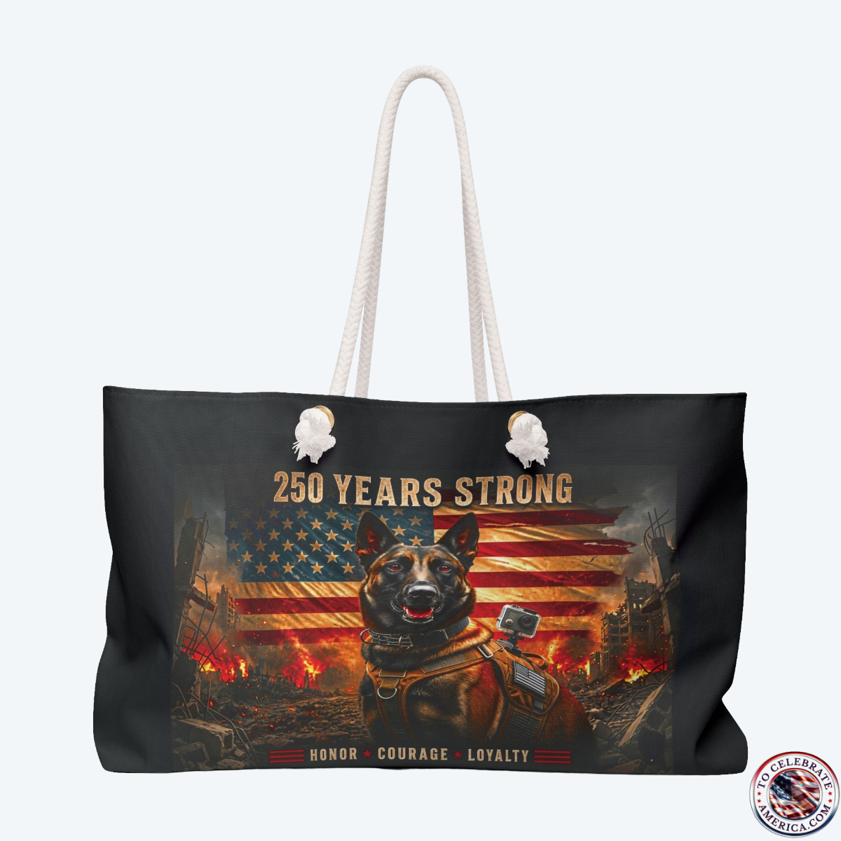 Large black weekender tote bag featuring a patriotic tactical K9 German Shepherd graphic under the text "250 Years Strong" and a distressed American flag backdrop. The bag rests on a white background, showcasing thick cream cotton rope handles with gold metal grommets.