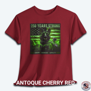 An Antique Cherry Red graphic t-shirt displayed flat, featuring a night-vision green overlay design of a tactical working K9 dog in front of a weathered US flag. The text reads "250 Years Strong" at the top and "HONOR ā
COURAGE ā
LOYALTY" at the bottom.