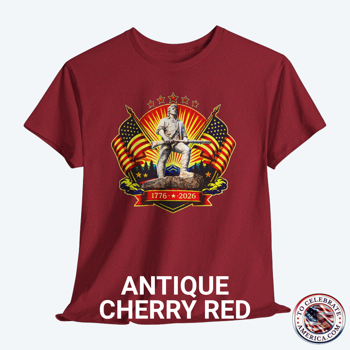 Antique Cherry Red Tee featuring Luminescent Minuteman 250th Anniversary design with American flags, stars, and 1776‑2026 banner on patriotic T‑shirt