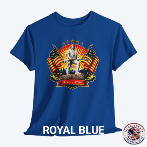 Royal Blue Tee featuring Luminescent Minuteman 250th Anniversary design with American flags, stars, and 1776‑2026 banner on patriotic T‑shirt