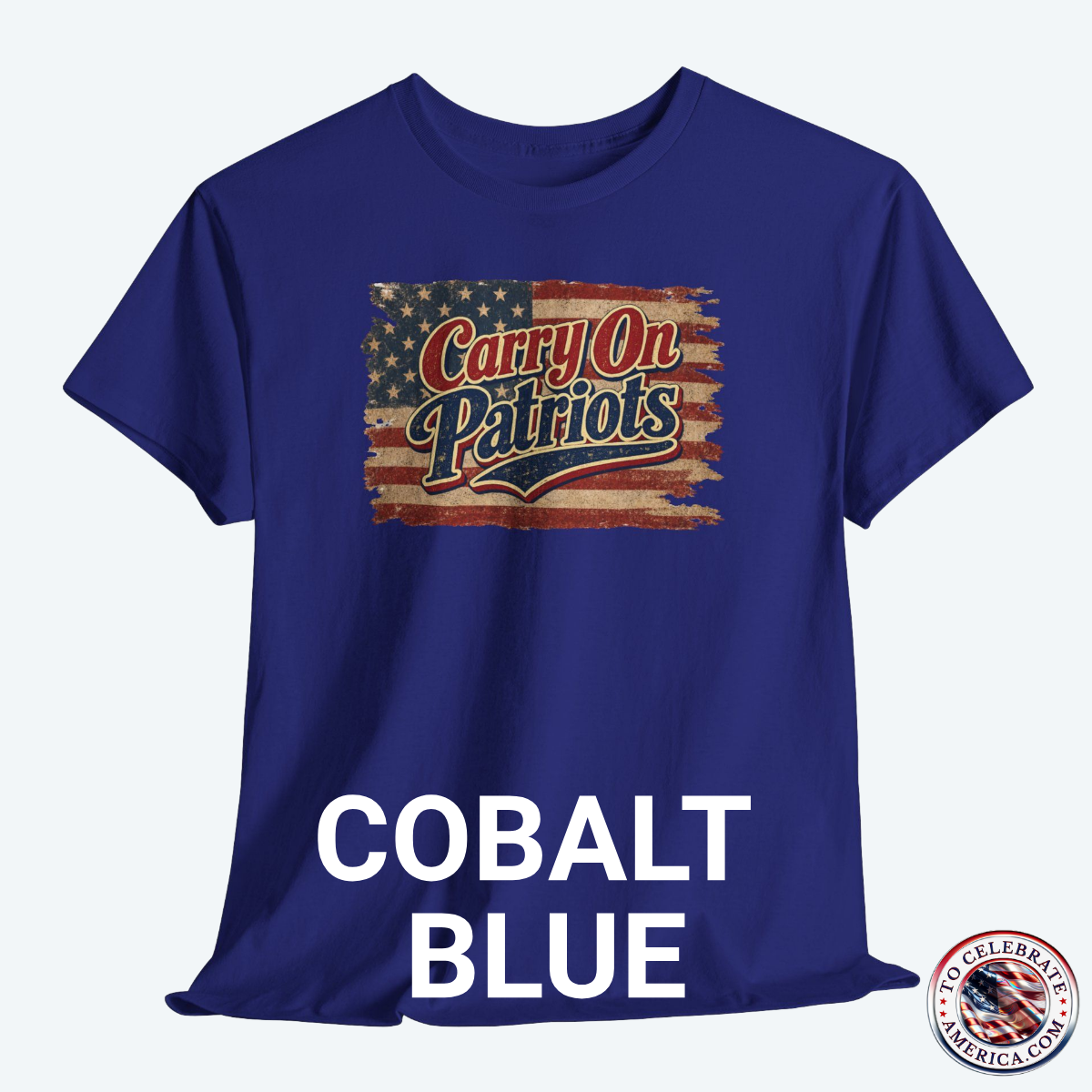 Cobalt Blue T‑shirt featuring distressed American flag background with bold ‘Carry On Patriots’ vintage lettering.”